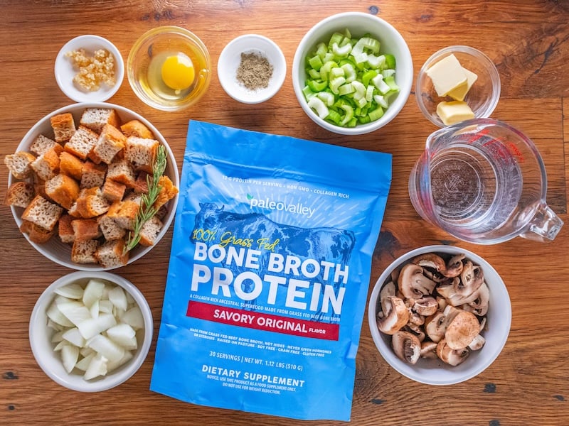 Top-down view of stuffing ingredients and pan of cooked stuffing made with Paleovalley Bone Broth Protein for a healthy holiday recipe twist.