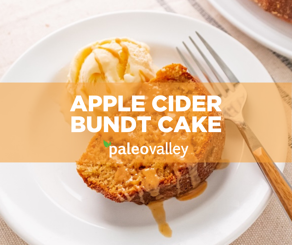 This soft, moist Apple Cider Bundt Cake is drizzled with caramel apple glaze and served with vanilla ice cream for a cozy fall treat.