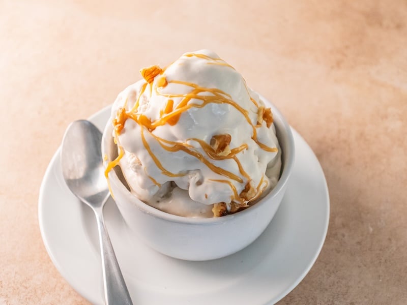 Creamy vanilla protein ice cream topped with caramel drizzle, made with Paleovalley Vanilla Whey Protein.