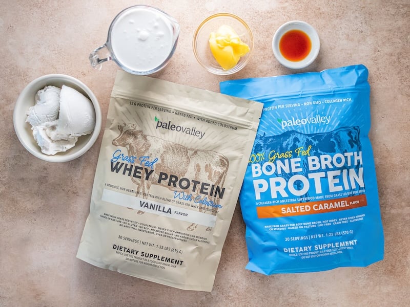 Ingredients for vanilla protein ice cream featuring Paleovalley Vanilla Whey Protein and Salted Caramel Bone Broth Protein.